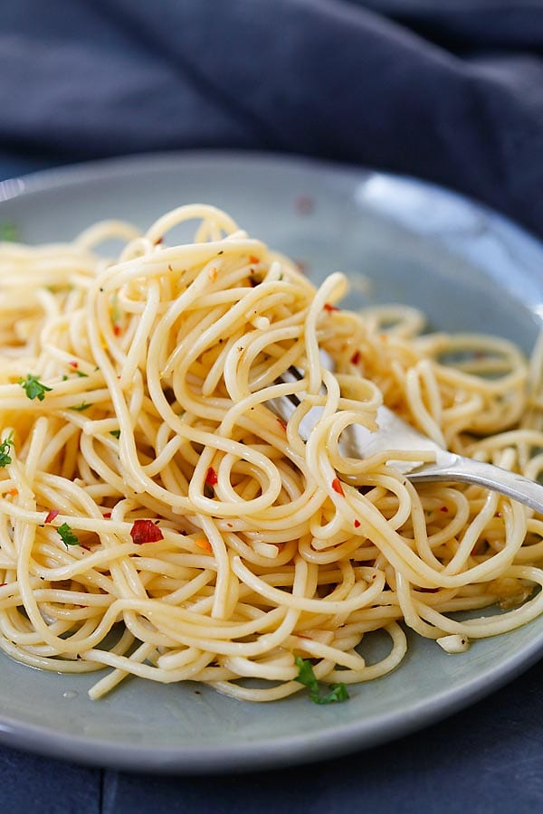 Easy homemade spaghetti in a plate with a fork.