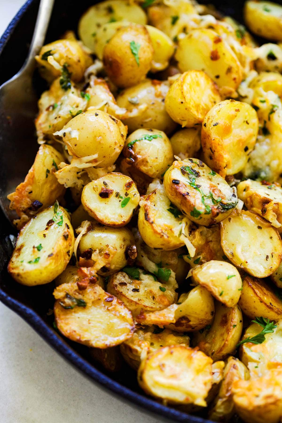 Easy tasty Italian roasted potatoes in a skillet.