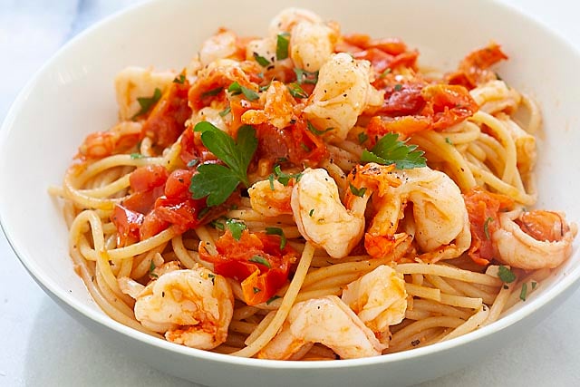 Shrimp pasta served on a plate.