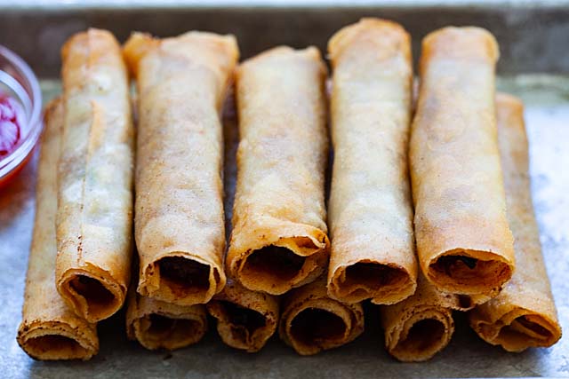 Lumpiang Shanghai with ground pork and vegetable filling, deep-fried and ready to serve.