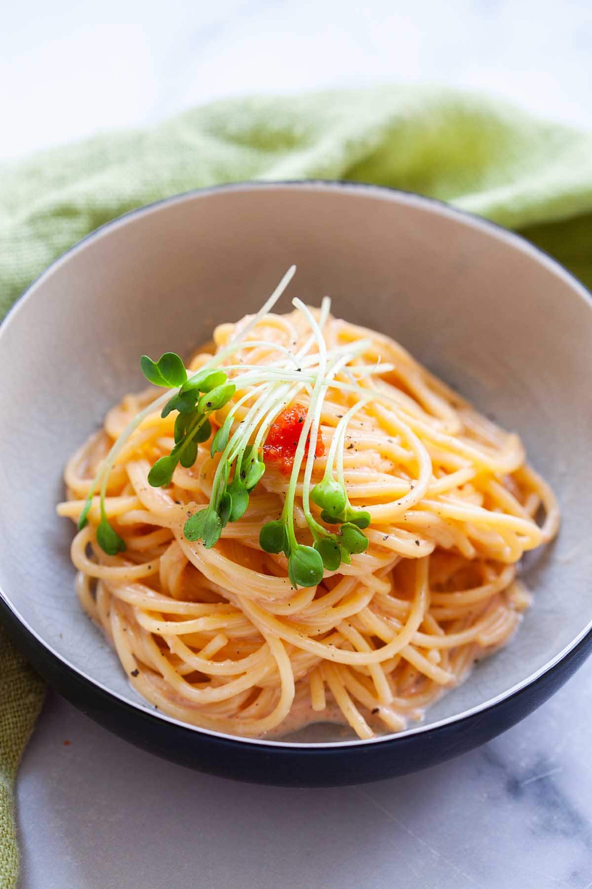 Pasta covered in Mentaiko sauce topped with Mentaiko spicy pollock caviar and microgreen.