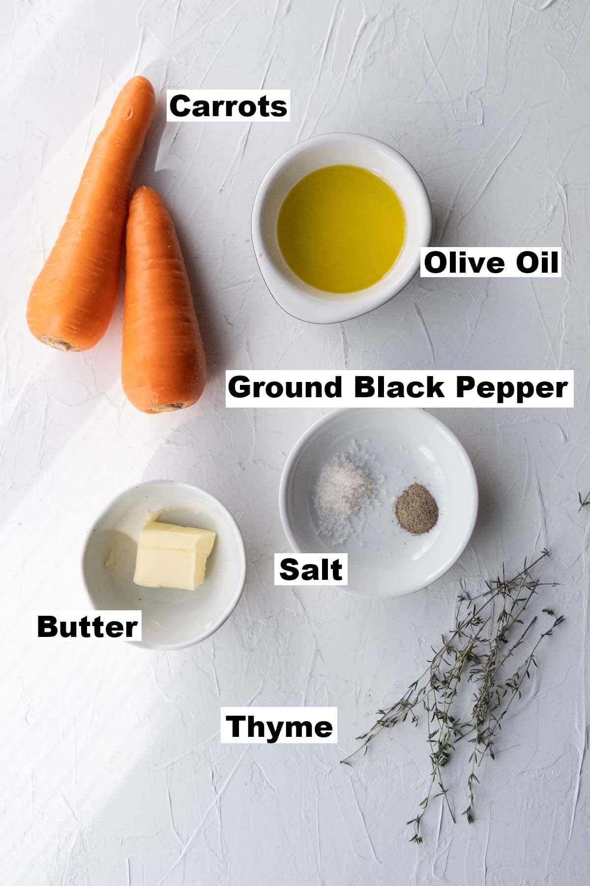 Ingredients for roasted carrots with thyme recipe.