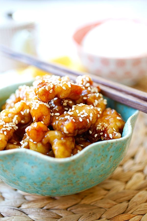 Sesame chicken ready to serve in a Chinese bowl.