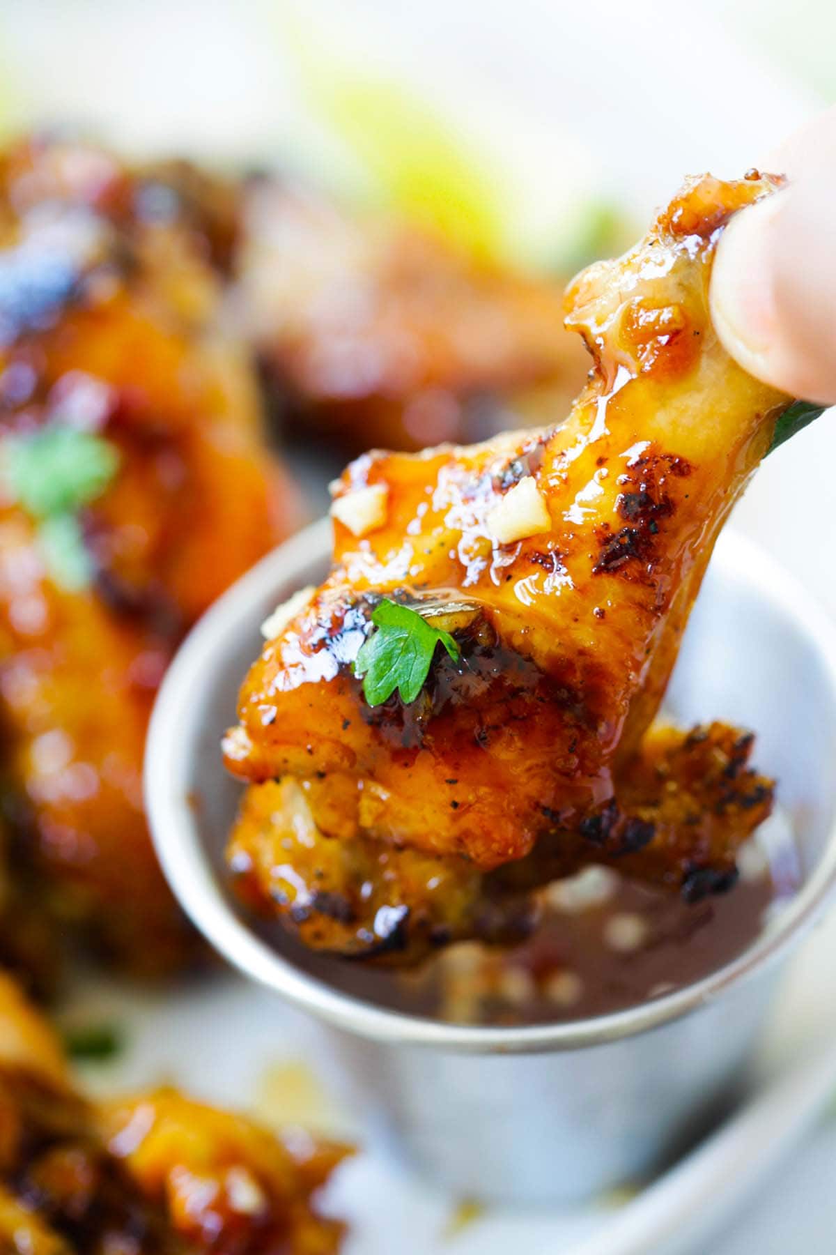 Easy homemade chicken wings dipped into chicken wings dipping sauce.