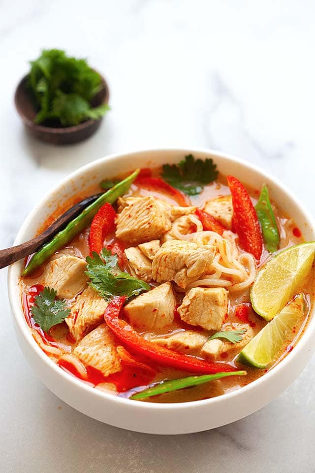 Coconut chicken noodle soup with Thai spices and broth.