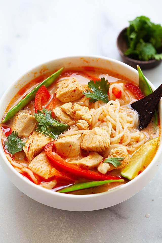 Thai noodle soup broth recipe with chicken, red curry paste and coconut milk.